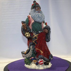 African American Santa Claus figurine, 12" high in resin
